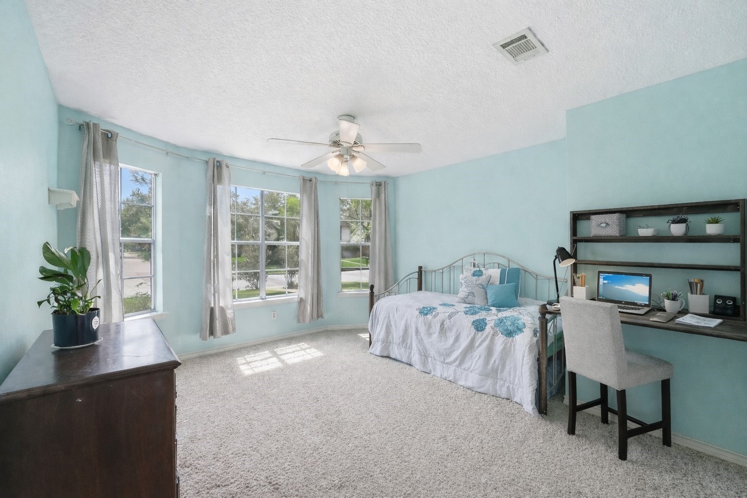 22338 Wetherburn Lane Katy, TX 77449 - Photo 15 of 36 Secondary bedroom as large as a primary! Featuring large bay windows and built in murphy style desk.