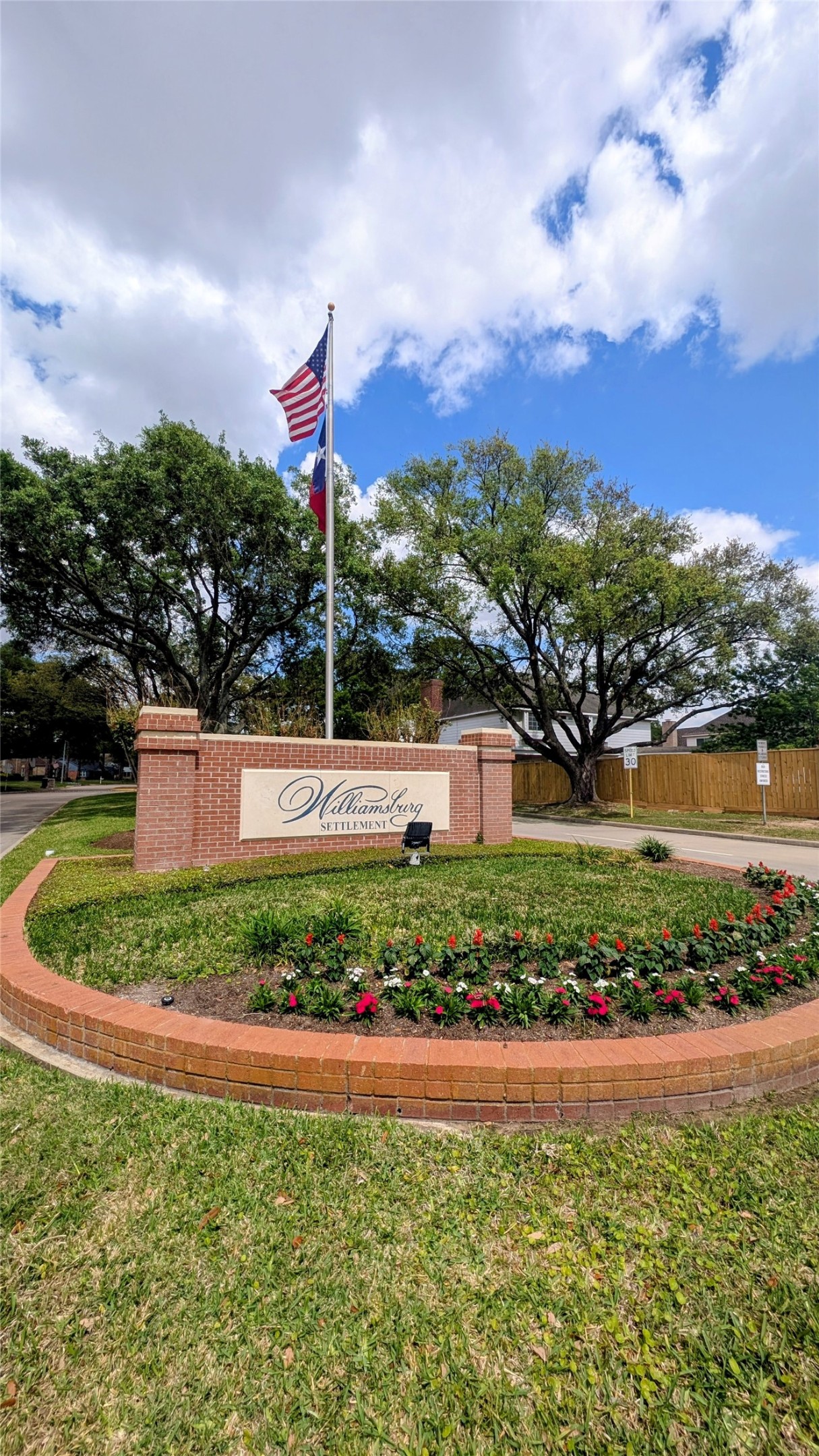 22338 Wetherburn Lane Katy, TX 77449 - Photo 25 of 36 Entrance to Williamsburg Settlement lit and beautifully landscaped.