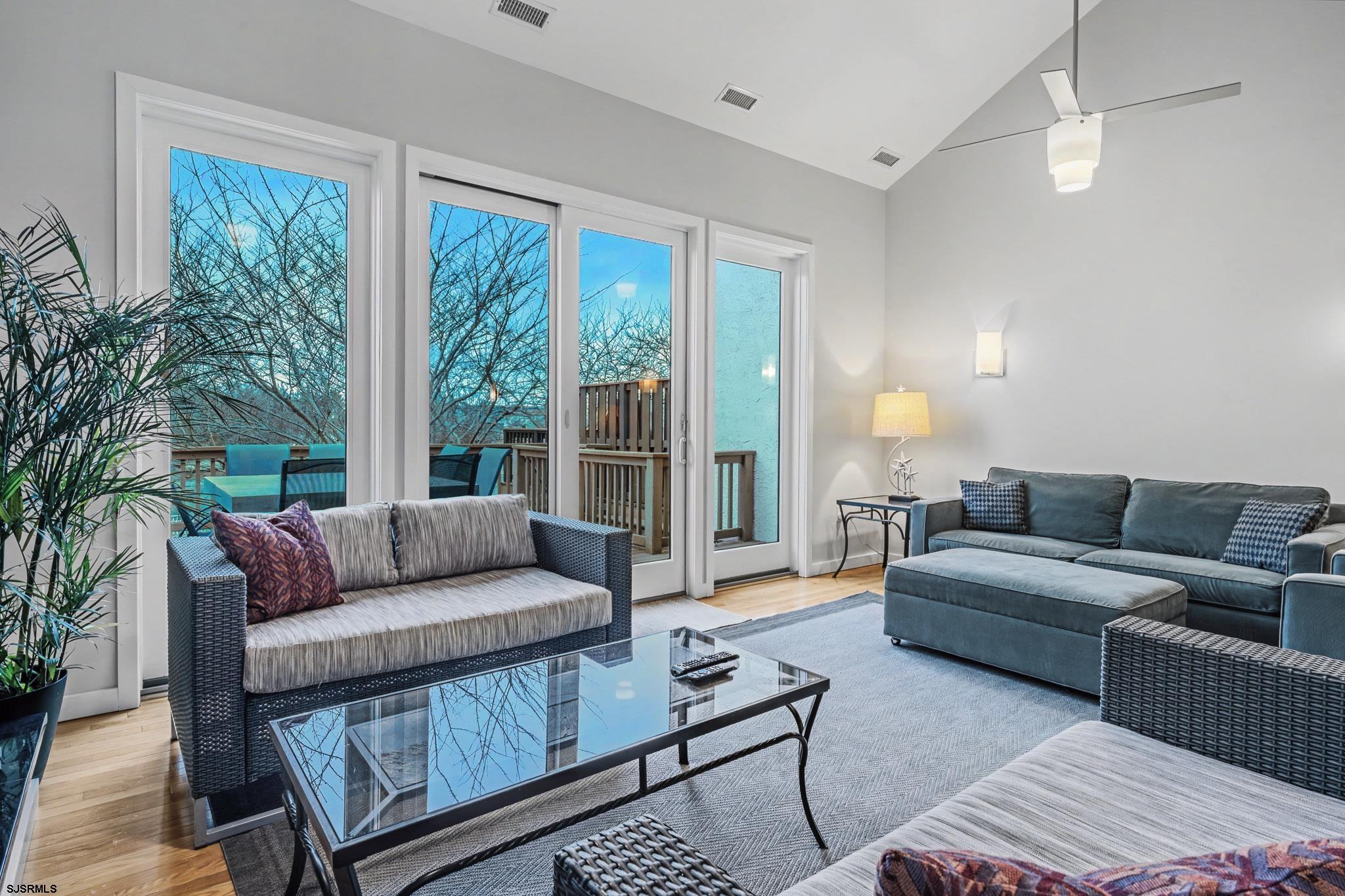 5 Beacon Lane Brigantine, NJ 08203 - Photo 18 of 39 a living room with furniture and a large window