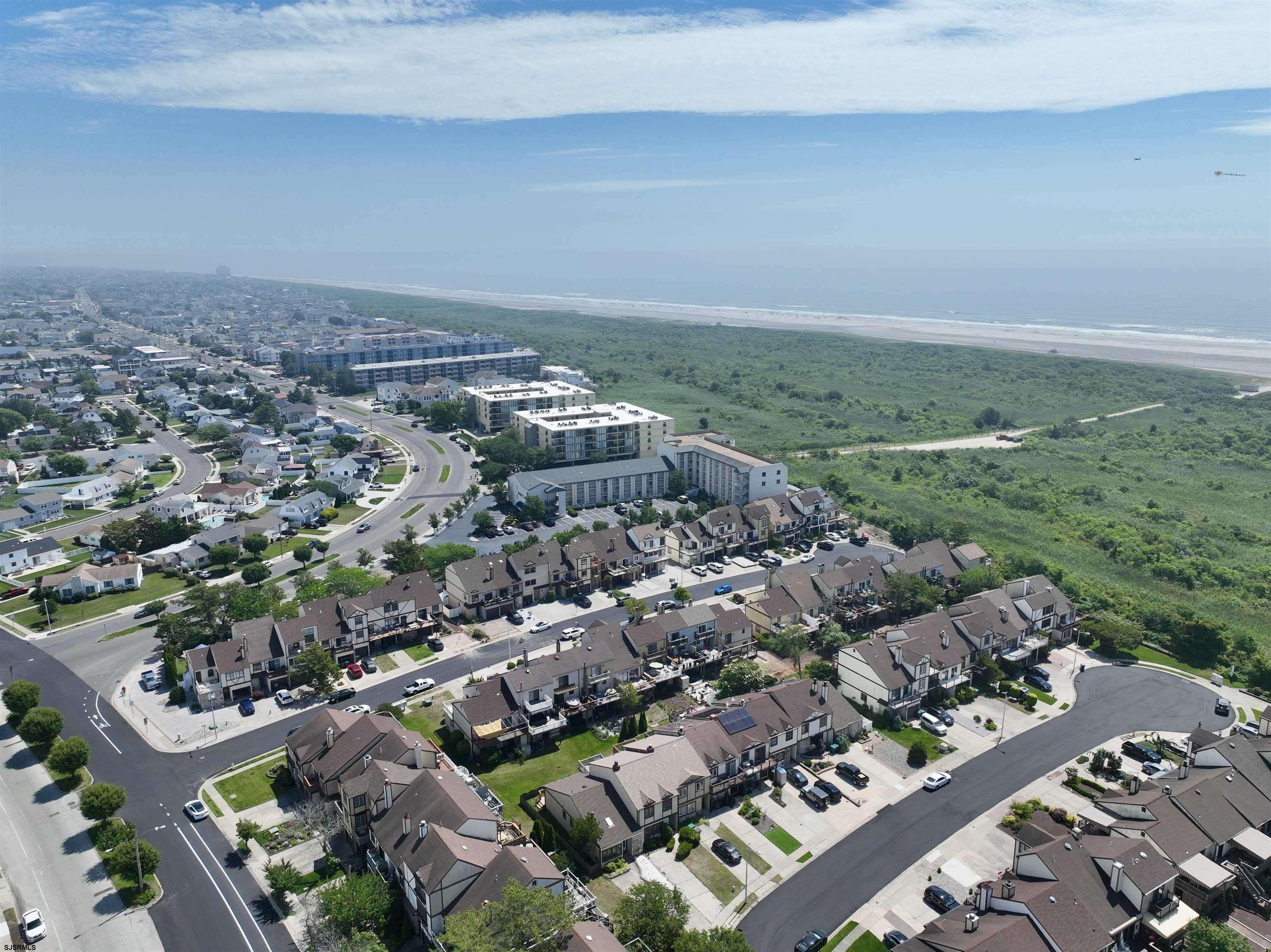 5 Beacon Lane Brigantine, NJ 08203 - Photo 2 of 39 an aerial view of a city with lots of residential buildings
