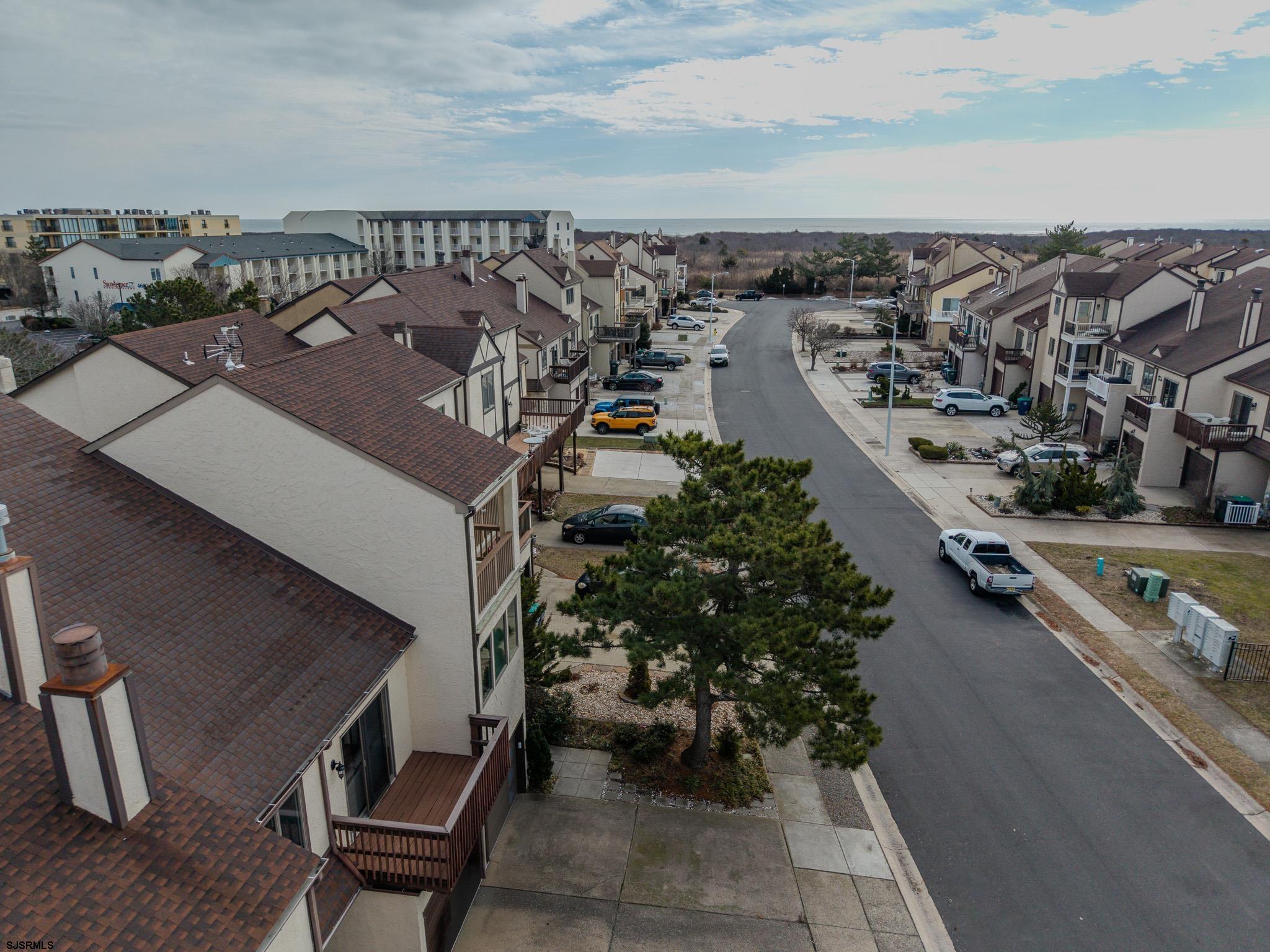 5 Beacon Lane Brigantine, NJ 08203 - Photo 31 of 39 an aerial view of a house with a yard