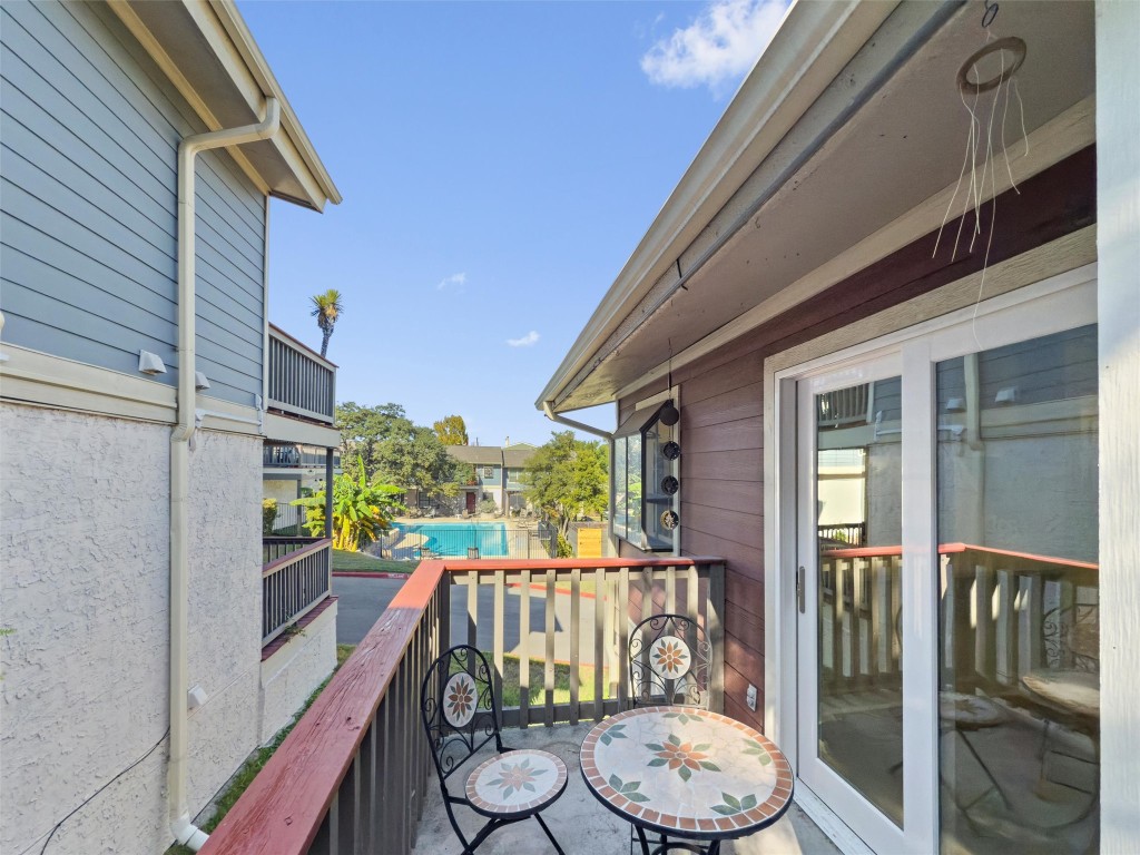2215 Post Road, Unit 2051 Austin, TX 78704 - Photo 23 of 37 a balcony with furniture and a potted plant