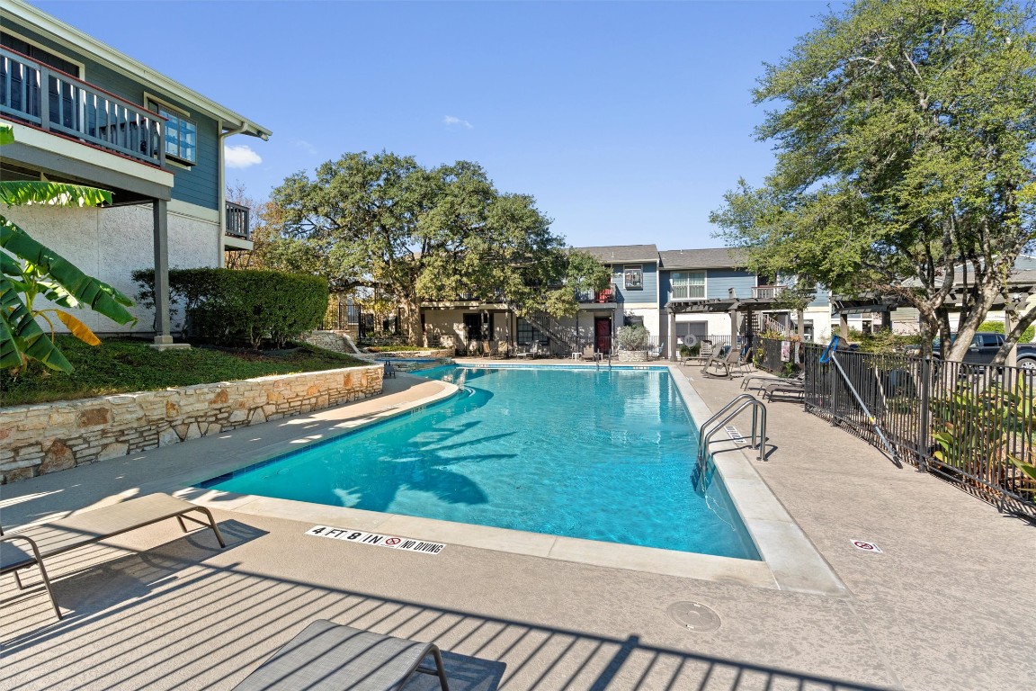 2215 Post Road, Unit 2051 Austin, TX 78704 - Photo 30 of 37 a view of a patio with chairs and plants