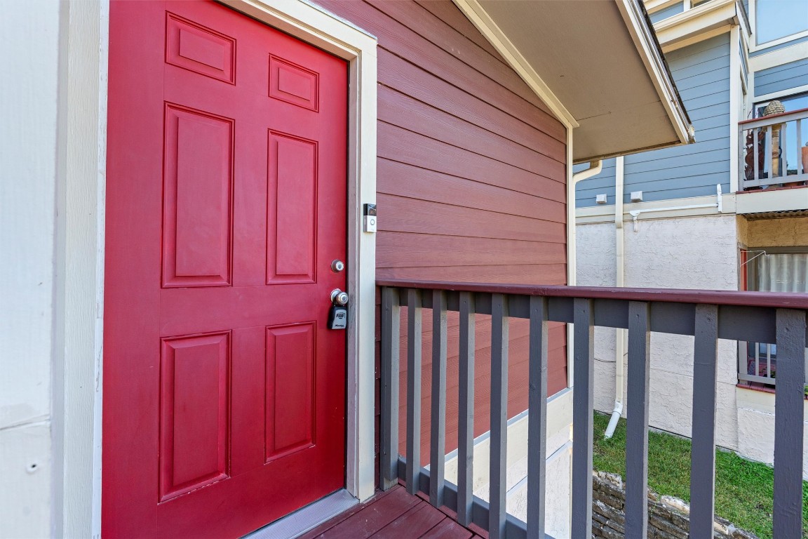 2215 Post Road, Unit 2051 Austin, TX 78704 - Photo 36 of 37 a view of a red door and a window