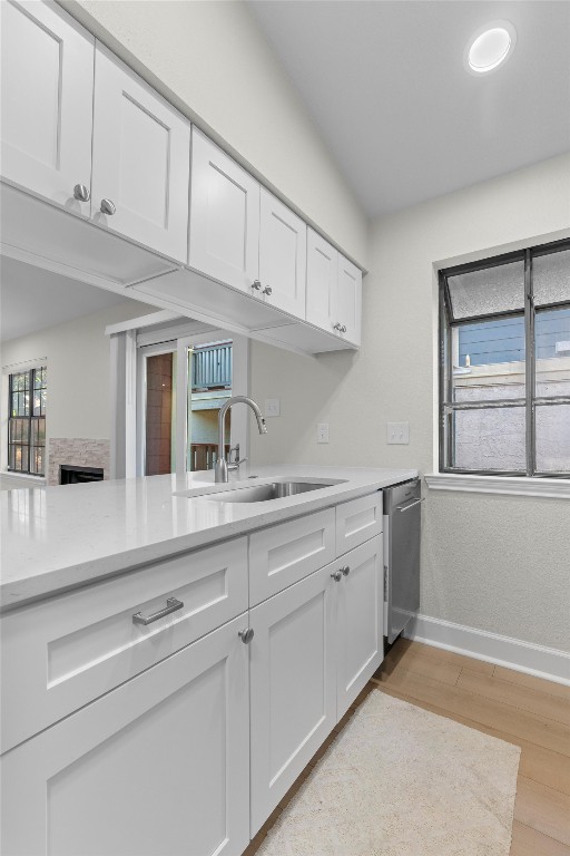 2215 Post Road, Unit 2051 Austin, TX 78704 - Photo 9 of 39 a kitchen with granite countertop white cabinets and white appliances