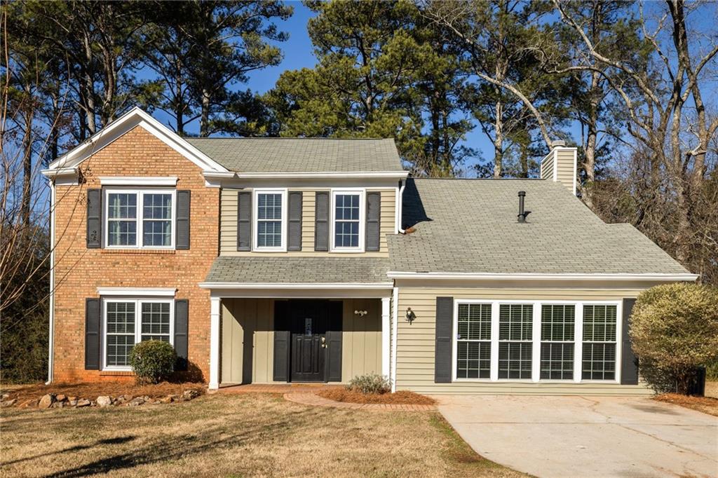 3384 Southern Oaks Court Decatur, GA 30034 - Photo 1 of 27 a front view of a house with a yard