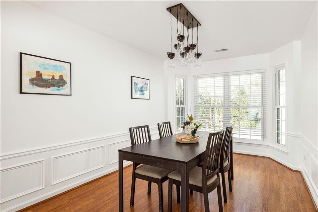 3384 Southern Oaks Court Decatur, GA 30034 - Photo 11 of 27 a view of a dining room with furniture window and wooden floor