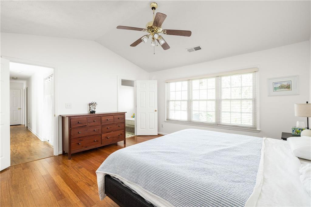3384 Southern Oaks Court Decatur, GA 30034 - Photo 15 of 27 a bedroom with a bed and a dresser