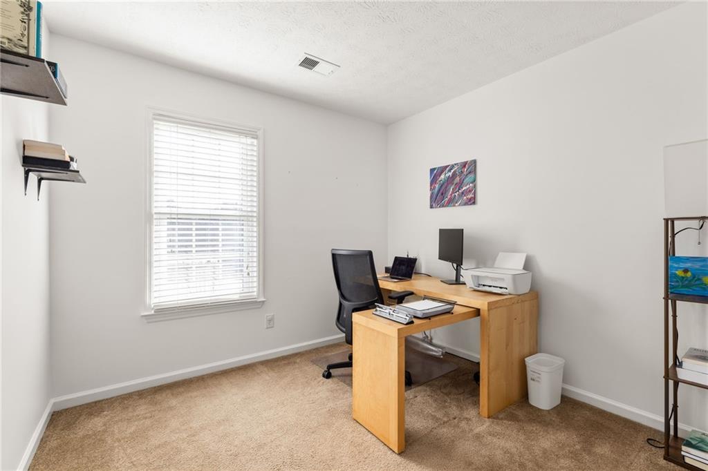 3384 Southern Oaks Court Decatur, GA 30034 - Photo 21 of 27 a workspace with a desk and a window