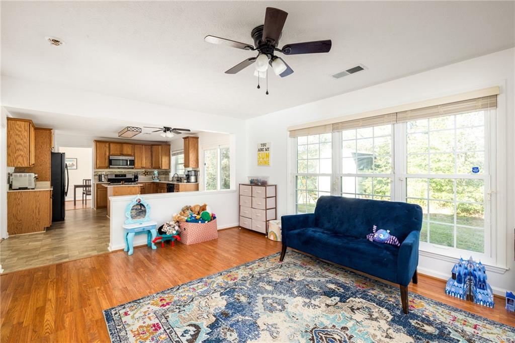 3384 Southern Oaks Court Decatur, GA 30034 - Photo 5 of 27 a living room with furniture and a large window