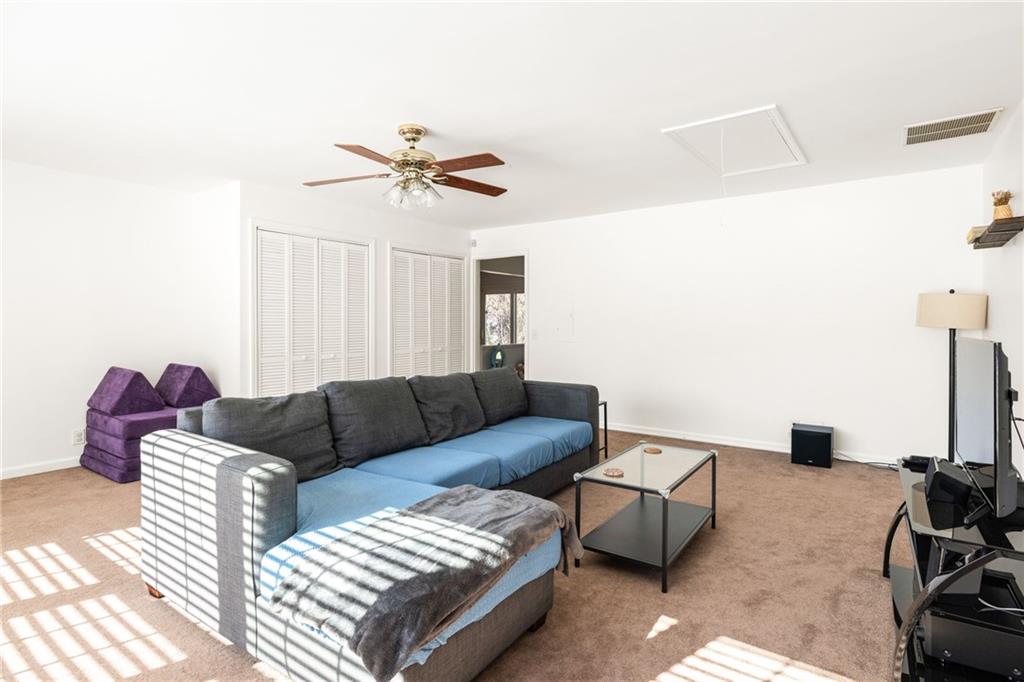 3384 Southern Oaks Court Decatur, GA 30034 - Photo 8 of 27 a living room with furniture and a couch