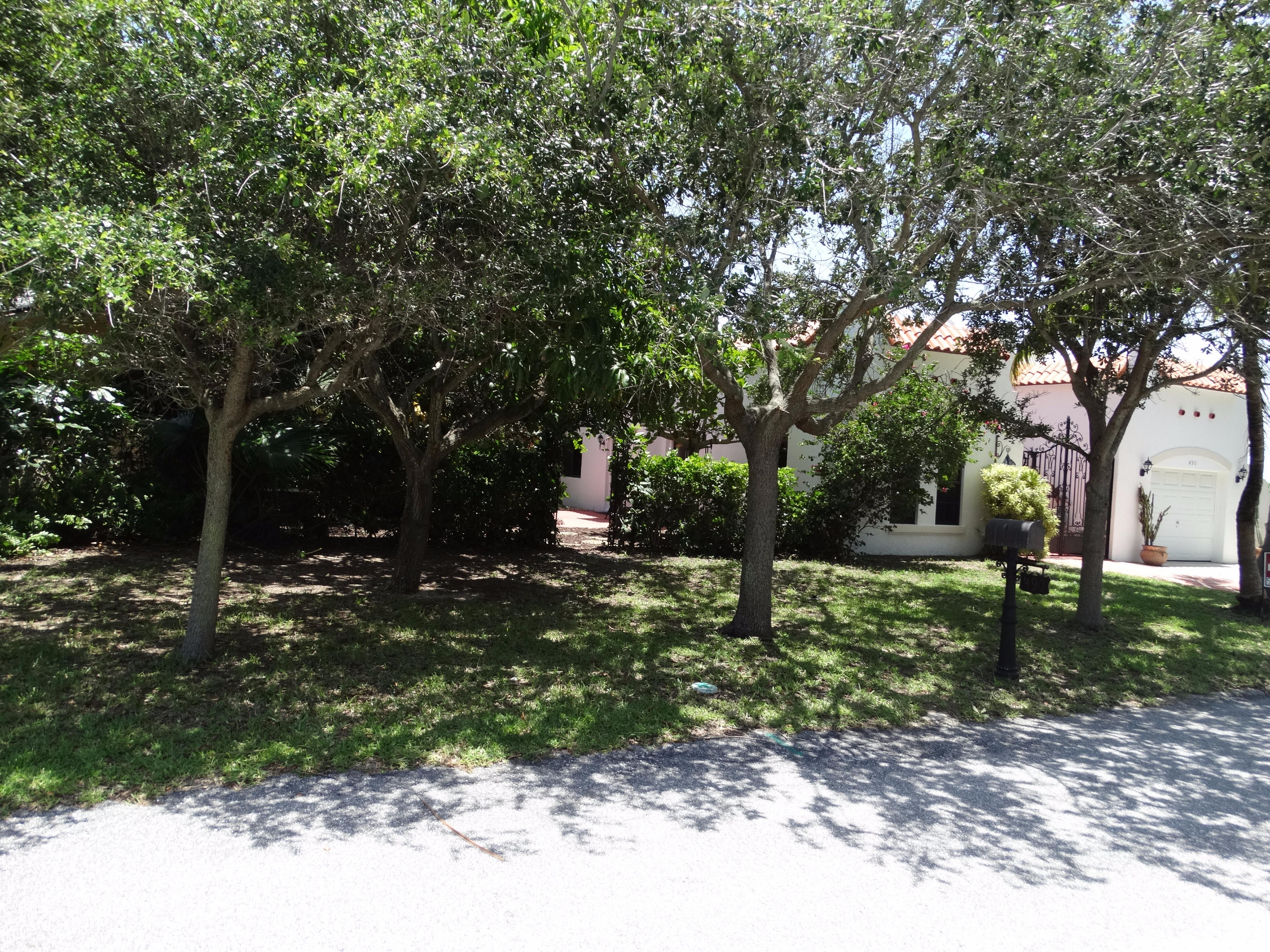 490 Neptune Road Juno Beach, FL 33408 - Photo 20 of 22 Front yard