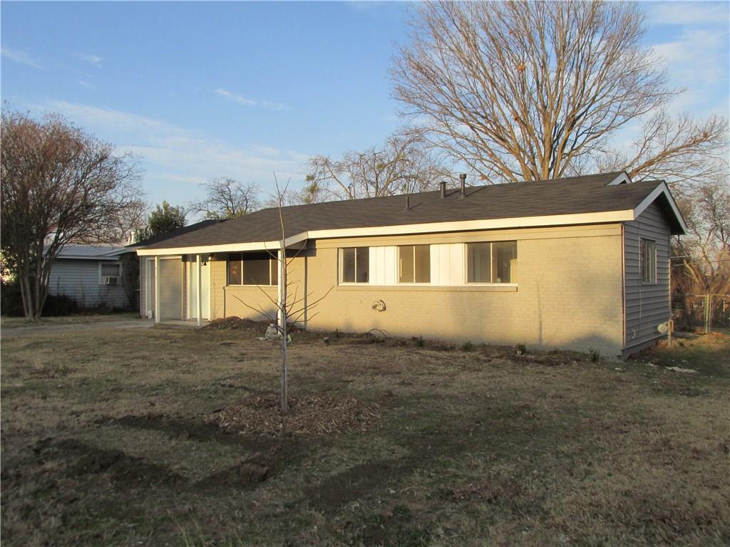 415 Hillcrest Street Mansfield, TX 76063 - Photo 1 of 1 a front view of a house with a garden