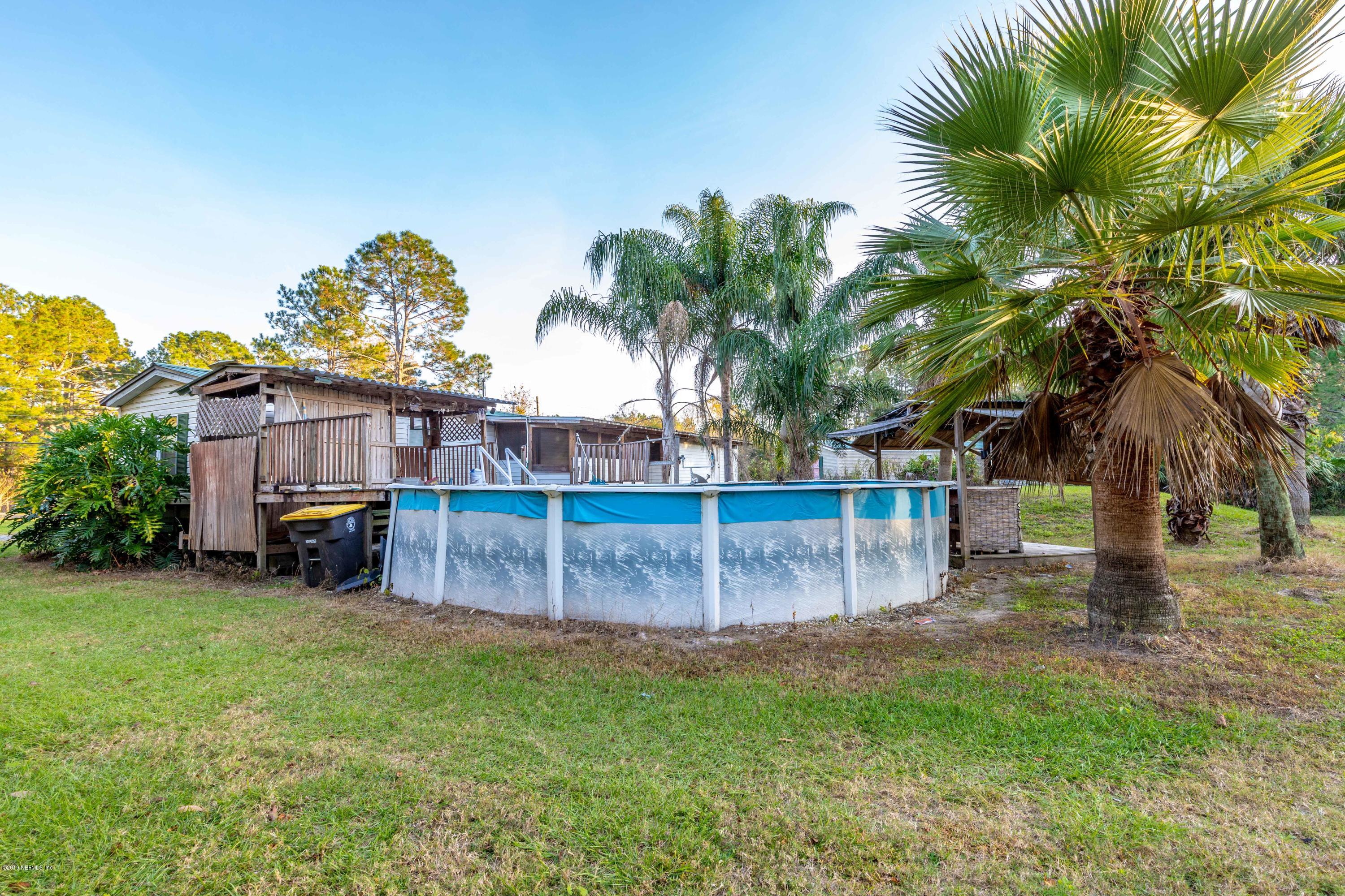 7840 Old Middleburg Road South Jacksonville, FL 32222 - Photo 11 of 46 a view of a yard with a slide
