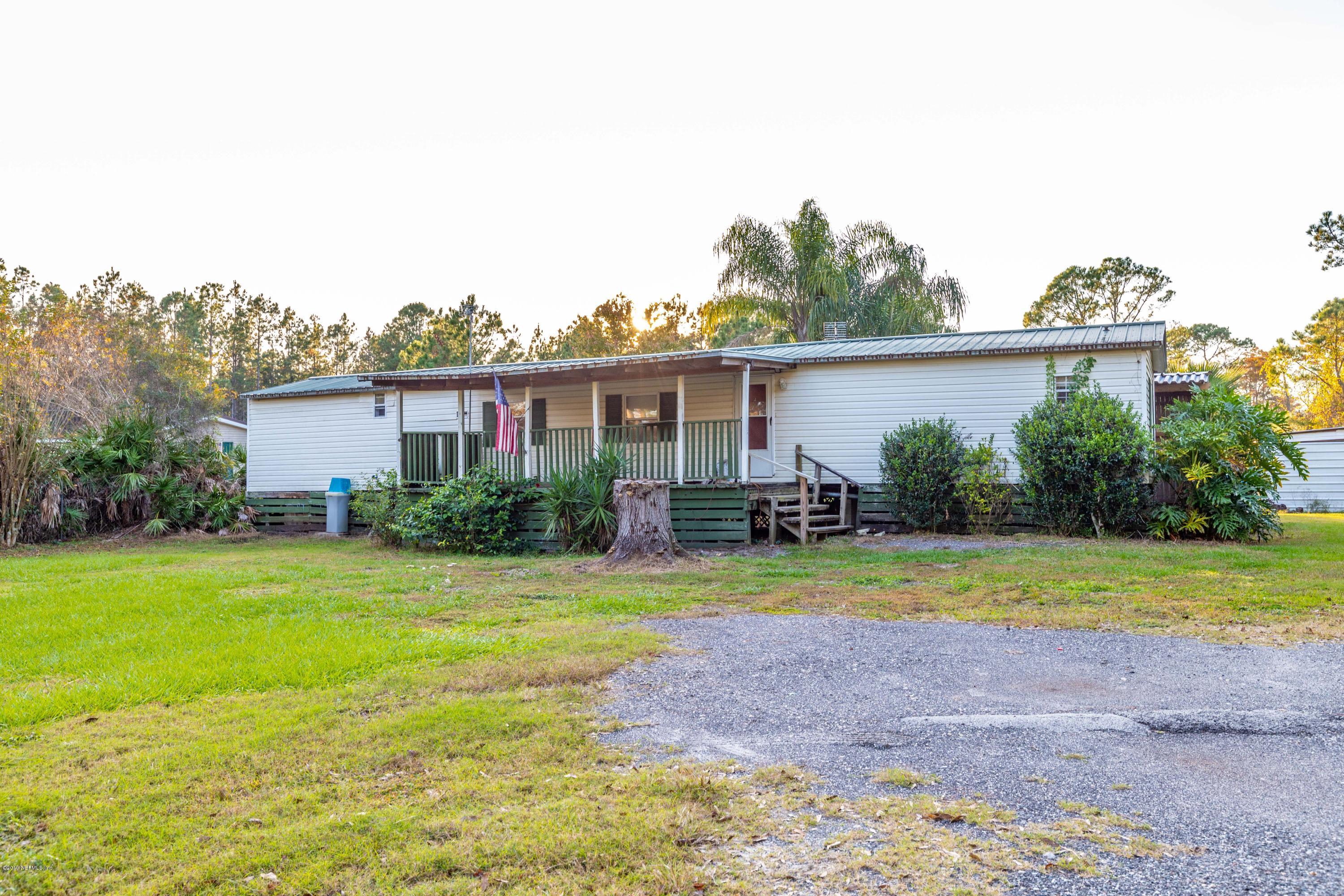 7840 Old Middleburg Road South Jacksonville, FL 32222 - Photo 16 of 46 a view of outdoor space yard and swimming pool