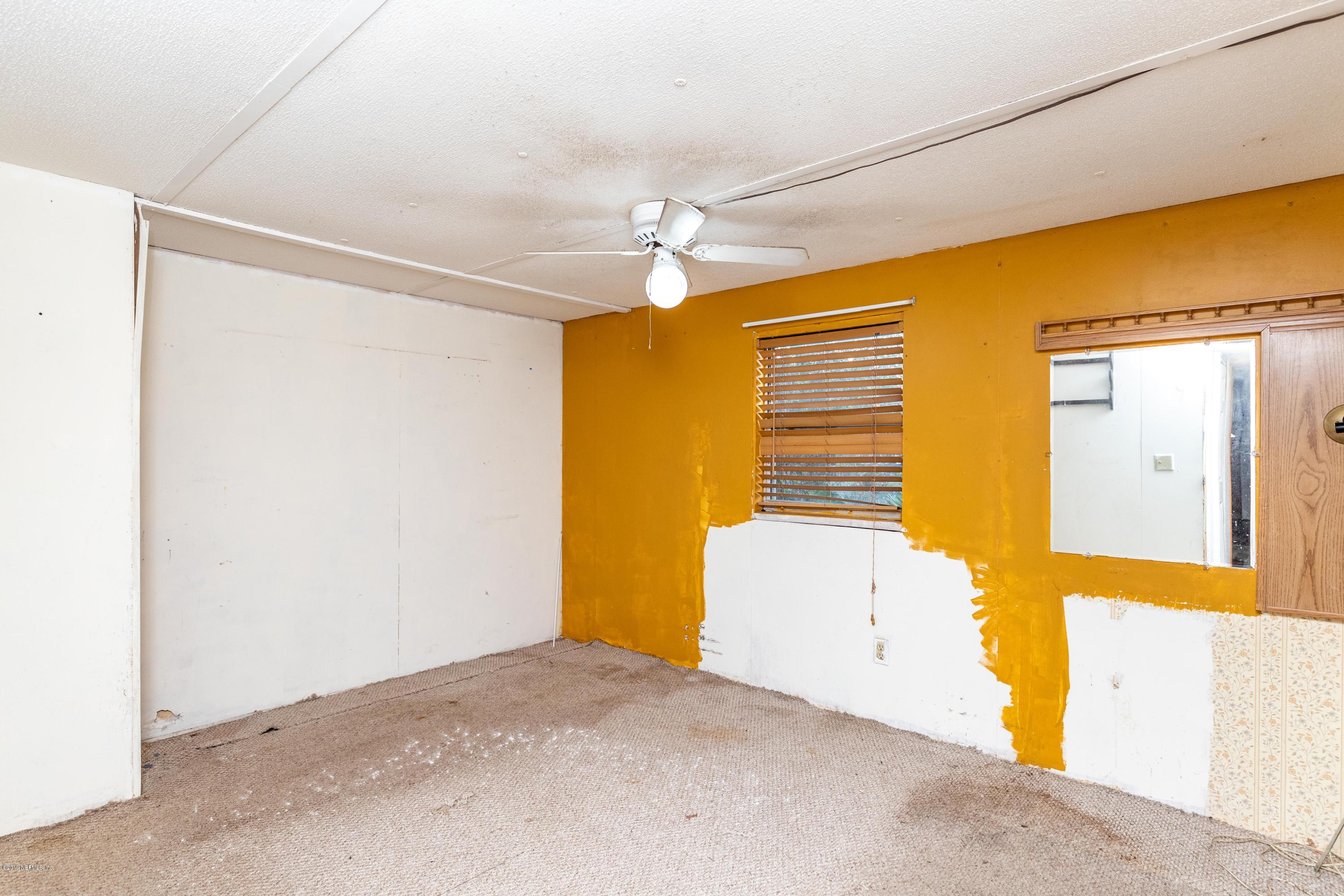 7840 Old Middleburg Road South Jacksonville, FL 32222 - Photo 27 of 46 a view of an empty room with window