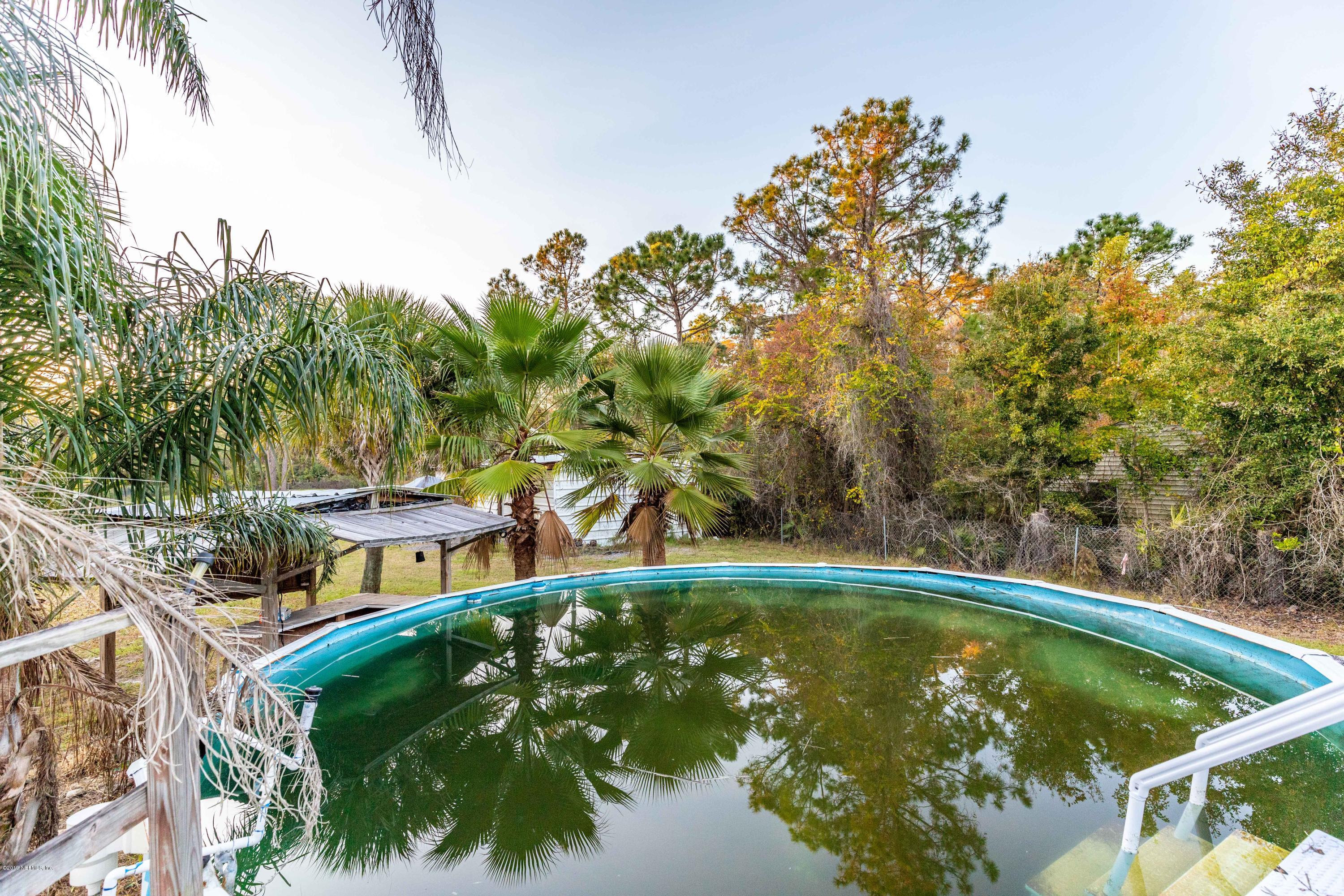 7840 Old Middleburg Road South Jacksonville, FL 32222 - Photo 43 of 46 a view of a swimming pool with a patio