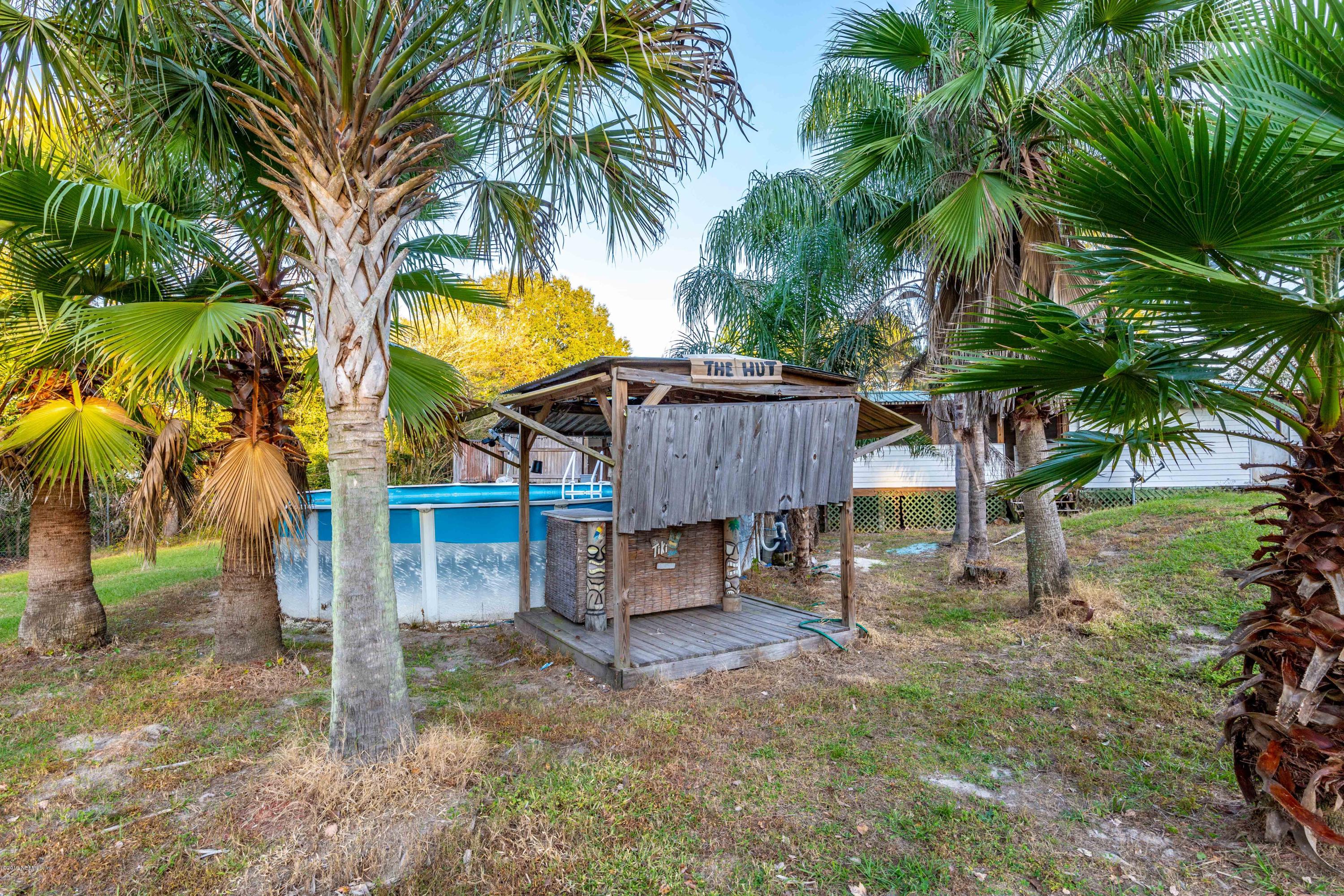 7840 Old Middleburg Road South Jacksonville, FL 32222 - Photo 9 of 46 a view of a backyard with a tree