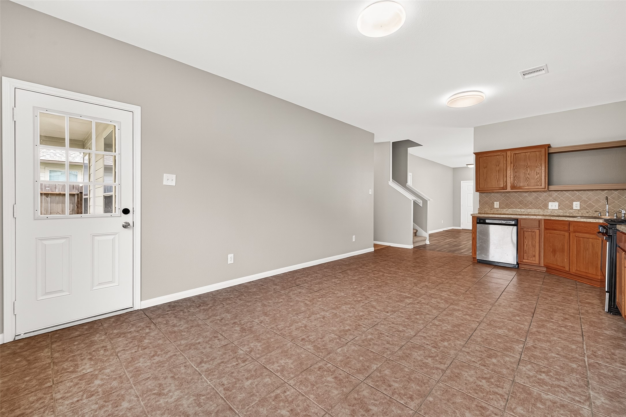 21327 Bella Flora Court Spring, TX 77379 - Photo 12 of 50 a view of kitchen with refrigerator and microwave
