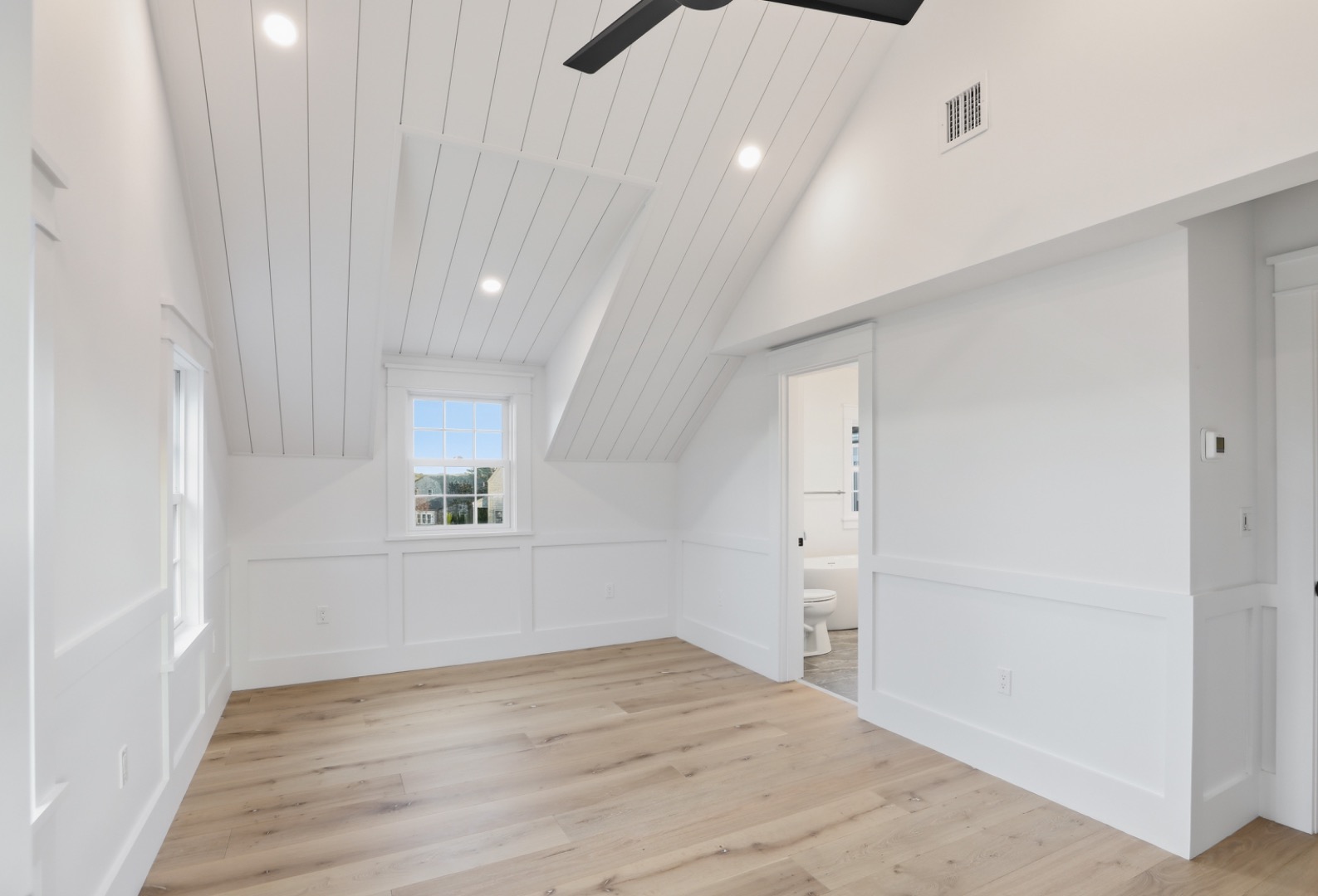 6 Mariner Way Nantucket, MA 02554 - Photo 23 of 31 a view of empty room with wooden floor and fan