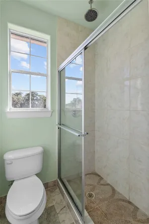 a view of a room with windows