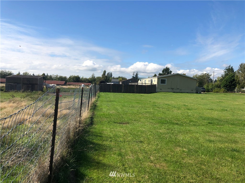 739 Lange Road Bellingham, WA 98226 - Photo 13 of 23 a view of a golf course with a lake view