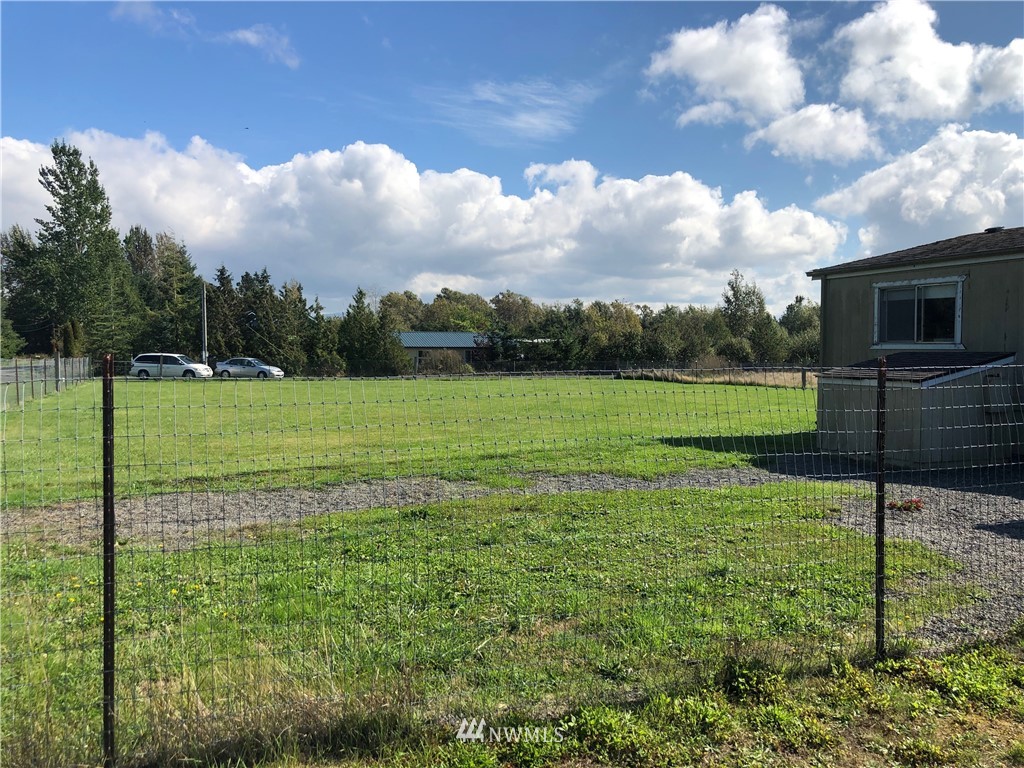 739 Lange Road Bellingham, WA 98226 - Photo 5 of 23 a view of a golf course with a lake