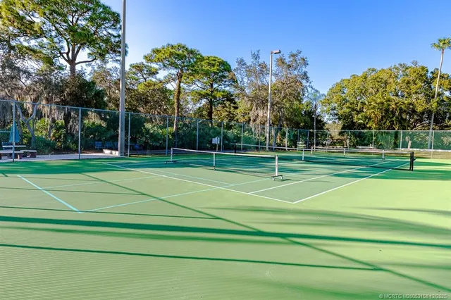 a view of a dining area with furniture window and wooden floor