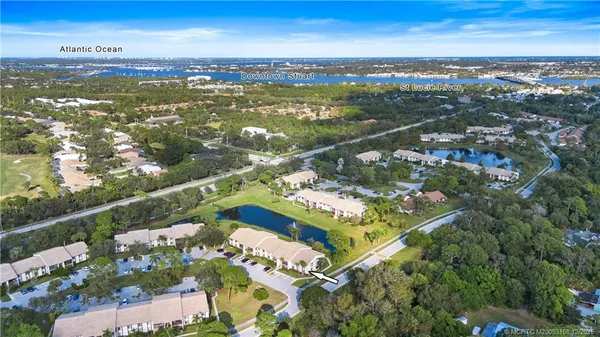 a view of city with ocean