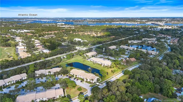a view of city with ocean
