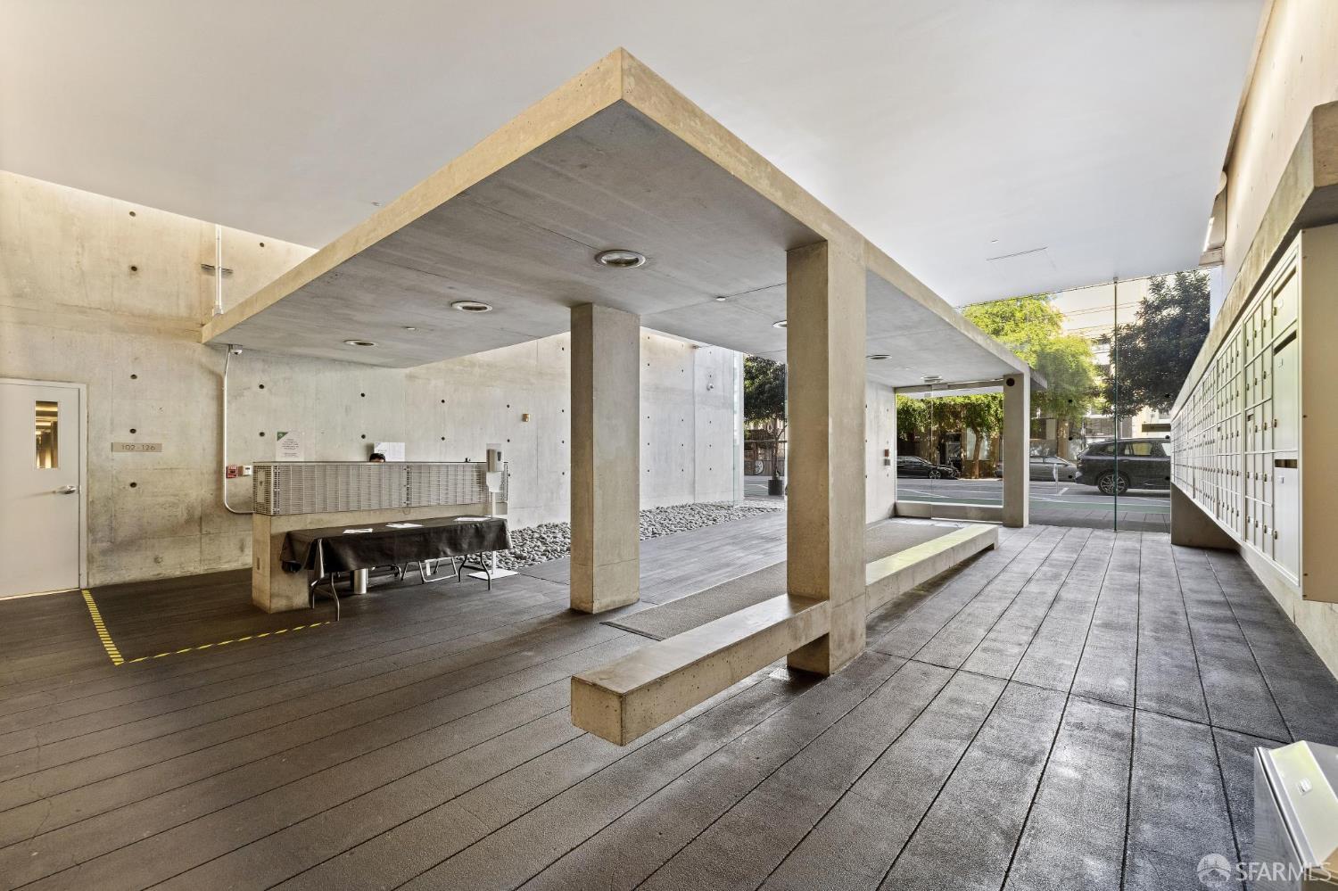 855 Folsom Street, Unit 112 San Francisco, CA 94107 - Photo 32 of 36 a view of kitchen with stainless steel appliances dining table and chairs