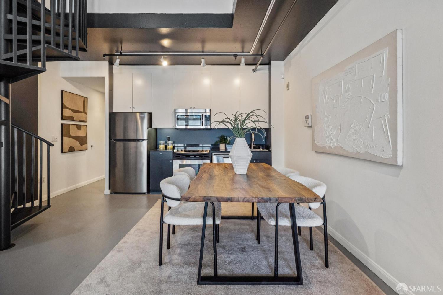 855 Folsom Street, Unit 112 San Francisco, CA 94107 - Photo 10 of 36 a view of a dining room with furniture