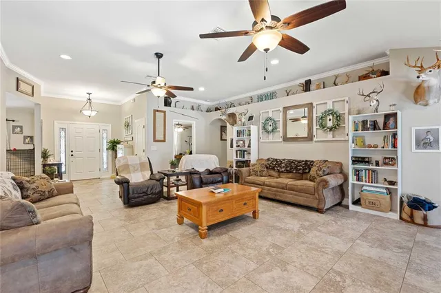a view of a house with porch and a yard