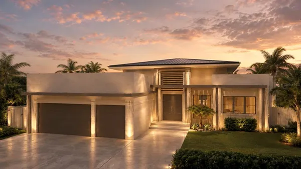 front view of a house with a yard