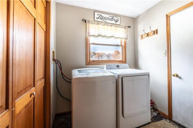 a utility room with dryer and washer