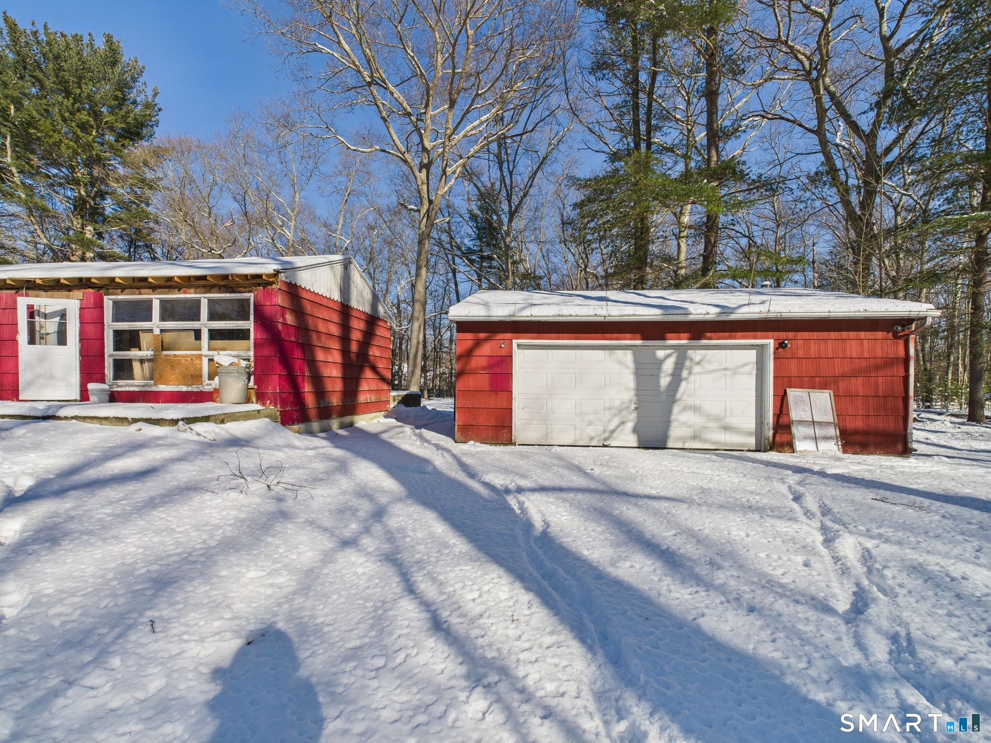 60 Highland Road Mansfield Center, CT 06250 - Photo 20 of 21 a view of a house with a yard and large trees