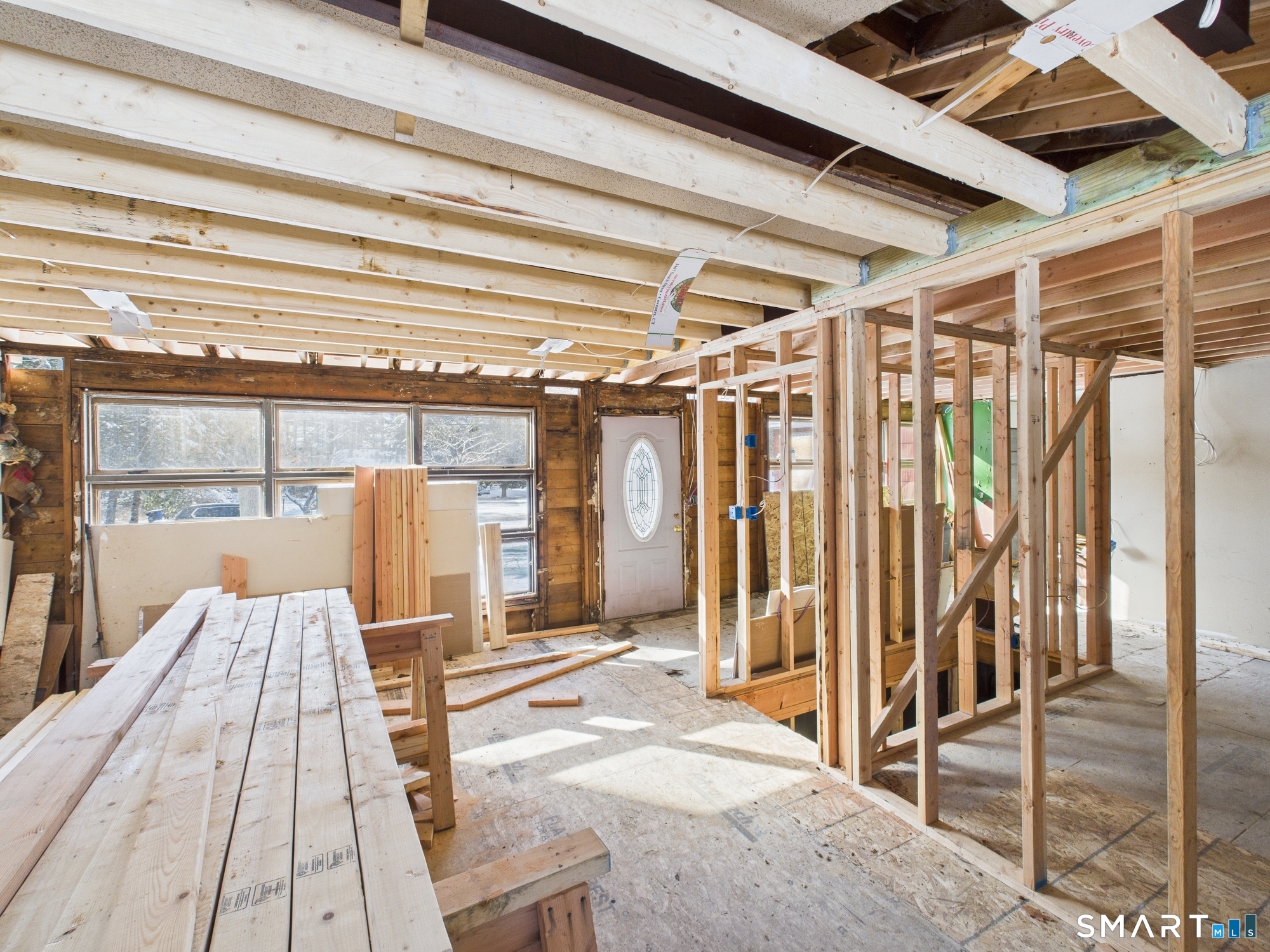 60 Highland Road Mansfield Center, CT 06250 - Photo 6 of 21 a spacious bedroom with a bed and a chandelier
