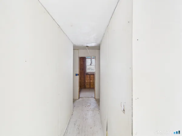 a view of a room with a window