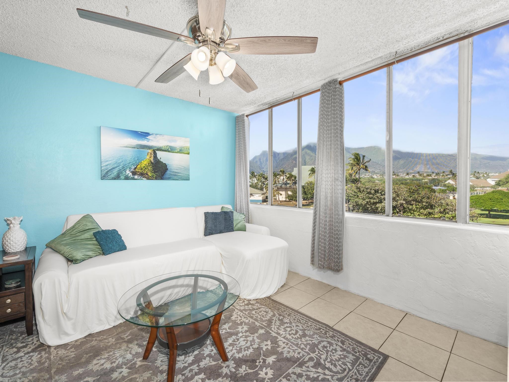 111 Kahului Beach Road, Unit D406 Kahului, HI 96732 - Photo 11 of 30 a living room with furniture and a large window