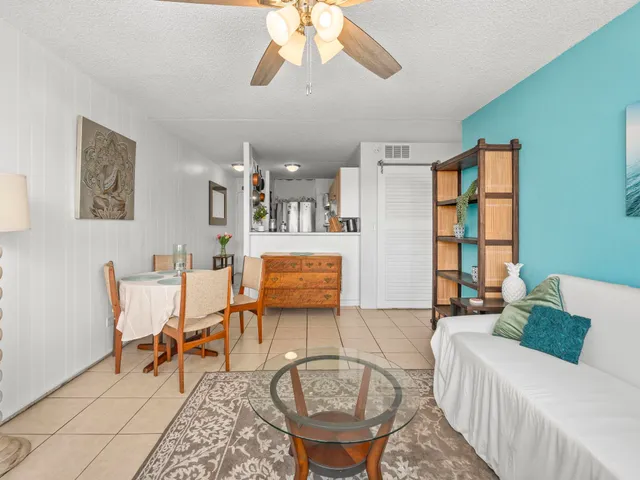 a living room with furniture and a table