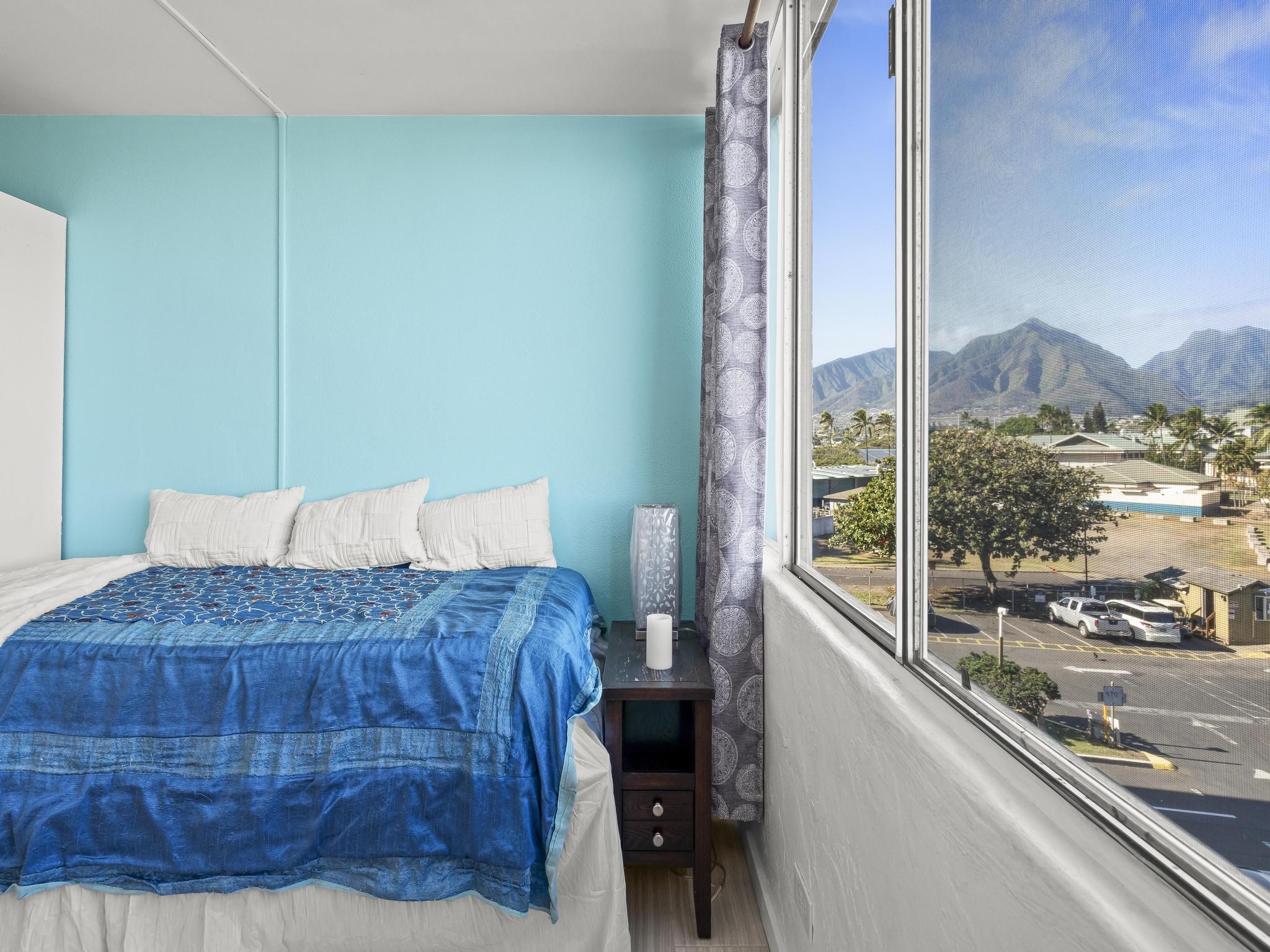 111 Kahului Beach Road, Unit D406 Kahului, HI 96732 - Photo 20 of 30 a bedroom with a bed and a window