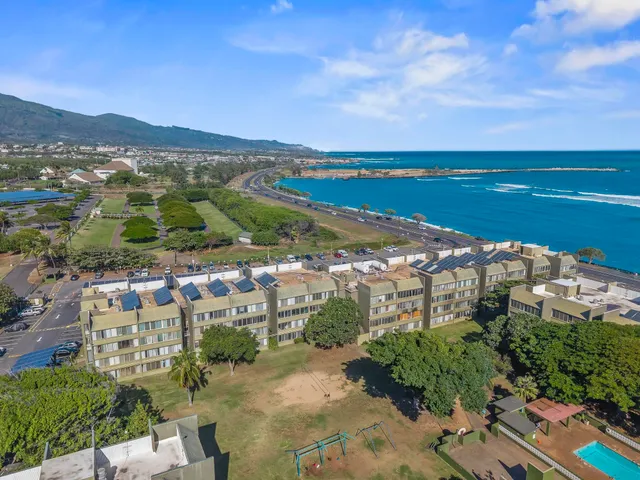 a view of a city with mountains in the background