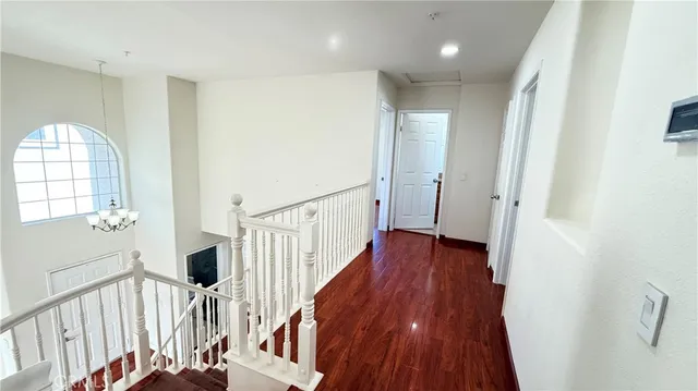 a view of entryway with wooden floor