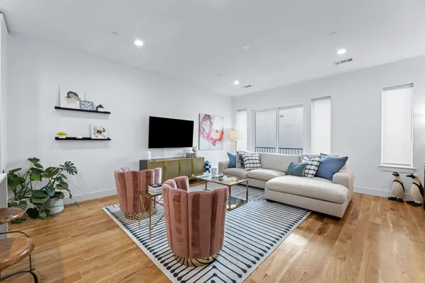 a kitchen with a sink a stove and refrigerator