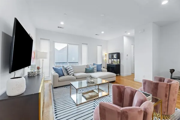 a view of a dining room with furniture