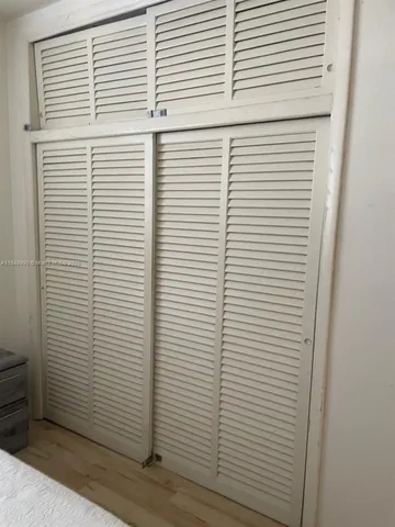 a bathroom with a sink toilet and mirror