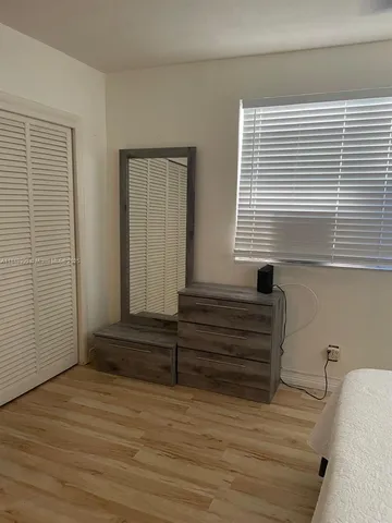 a bathroom with a bathtub and a sink