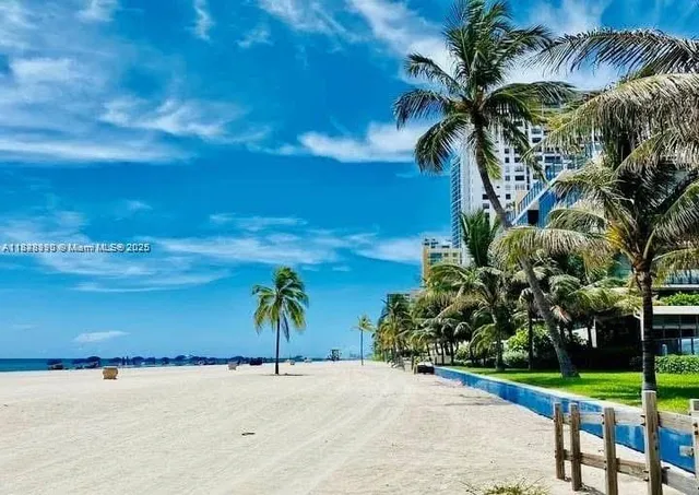a view of a chairs and table in the patio