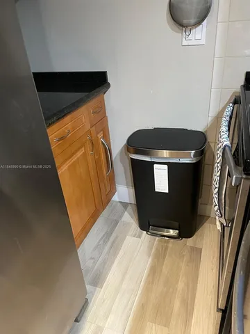 a kitchen with a sink and a stove
