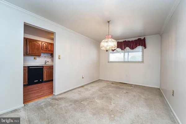 a view of a kitchen with a sink cabinets and window